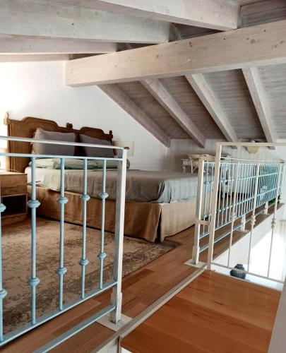 a bedroom with a bunk bed and a loft at Palazzo San Giuseppe in Nardò