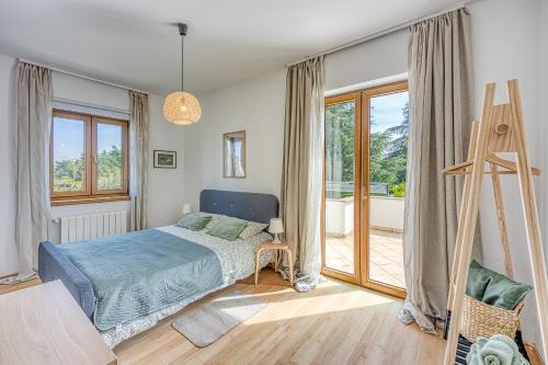 Postel nebo postele na pokoji v ubytování Casa Mareva