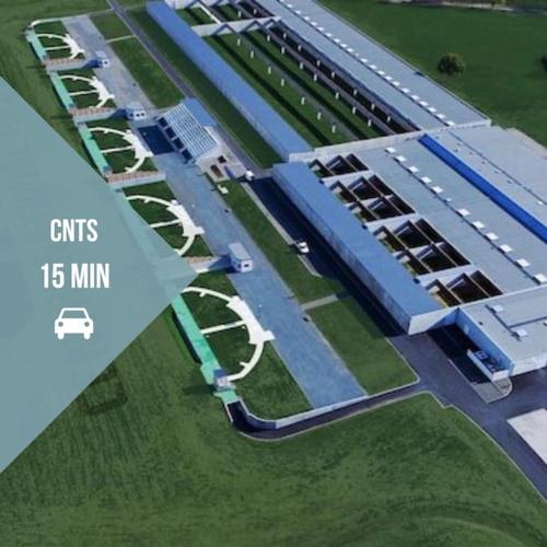an overhead view of a building with a parking lot at Le Gué • Élégance fonctionnelle • Parking simple in Saint-Maur