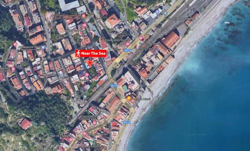 a map of a town next to the water at Casa Inzolia in Giardini Naxos