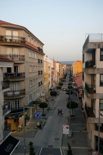 a view of a city street with buildings at Estrela de mar in O Grove