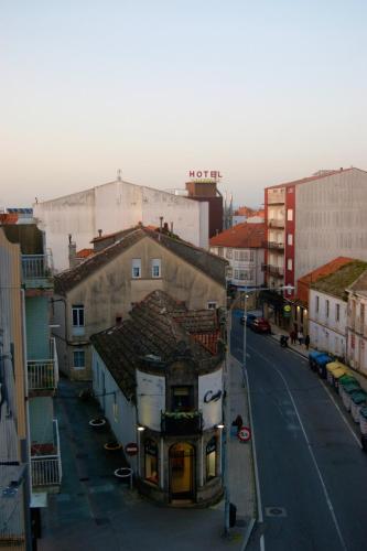 a view of a city street with buildings at Estrela de mar in O Grove