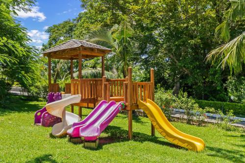 a playground with slides and a gazebo at Iririki Island Resort & Spa in Port Vila