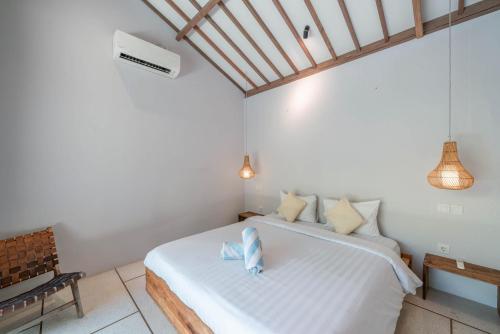 Ein Bett oder Betten in einem Zimmer der Unterkunft Villa Nina - Splendid 2-bedroom villa in Canggu
