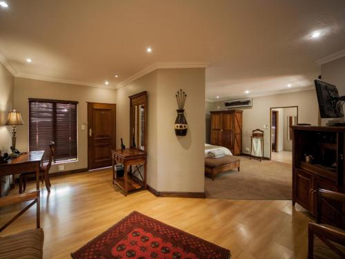 Ένα ή περισσότερα κρεβάτια σε δωμάτιο στο Fairview Hotels,Spa & Golf Resort