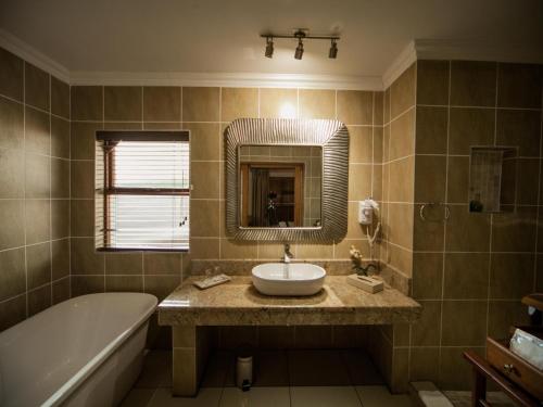 Ένα μπάνιο στο Fairview Hotels,Spa & Golf Resort