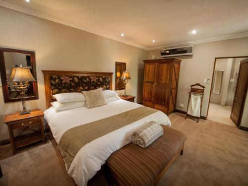 Ένα ή περισσότερα κρεβάτια σε δωμάτιο στο Fairview Hotels,Spa & Golf Resort