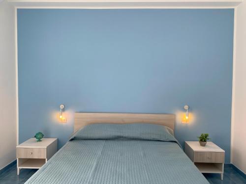 Ένα ή περισσότερα κρεβάτια σε δωμάτιο στο Casa Emy