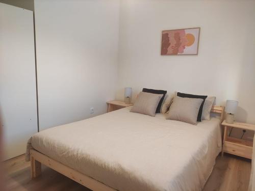 Un pat sau paturi într-o cameră la T1 Casa da Quinta