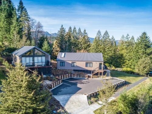 an aerial view of a house in the woods at Jacks Lodge Townhouse in Hanmer Springs