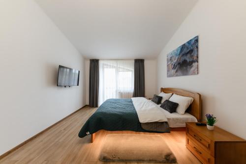 Ένα ή περισσότερα κρεβάτια σε δωμάτιο στο Luxury Apartments Uzhorod
