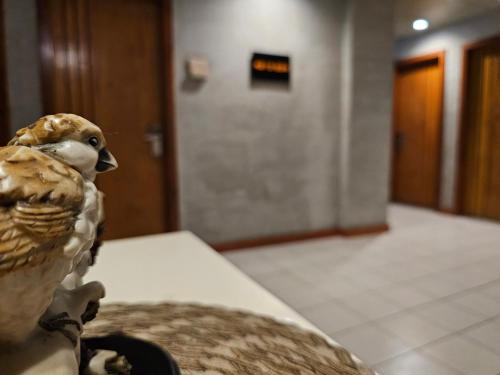 Postel nebo postele na pokoji v ubytování Tsai Hotel and Residences