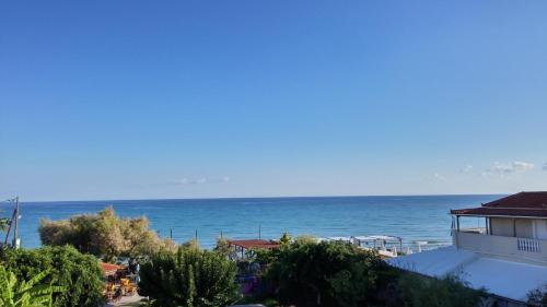 a view of the ocean from a building at Anetis Hotel in Tsilivi
