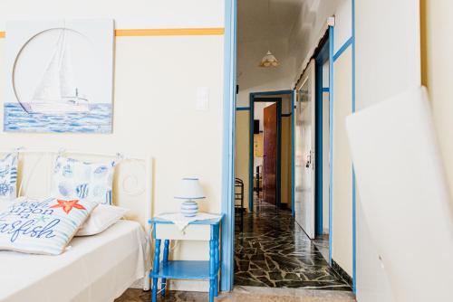 Postel nebo postele na pokoji v ubytování Mavromati Rooms