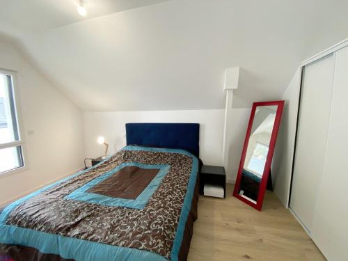 En eller flere senge i et værelse på KERSALINE - Maison neuve, Bourg et plage - K111