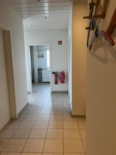 a hallway with a fire hydrant in a room at Zimmervermietung Conny in Elsterwerda
