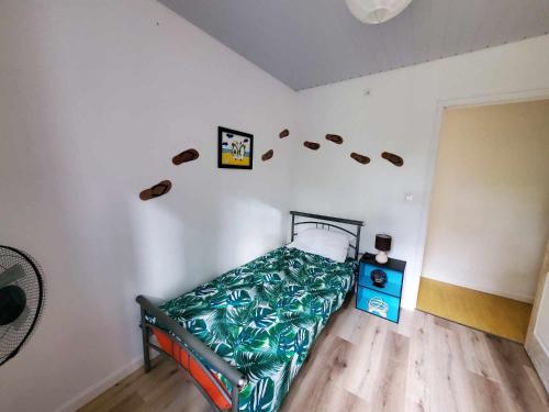 Cama o camas de una habitación en La Piaule De Nessadiou