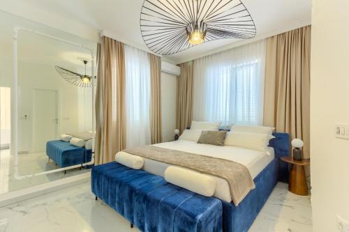 Giường trong phòng chung tại VILLA DANICA with heated pool and jacuzzi