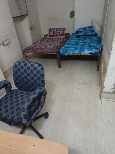 Кровать или кровати в номере House 1 First Floor Sidhi Vinayak Complex