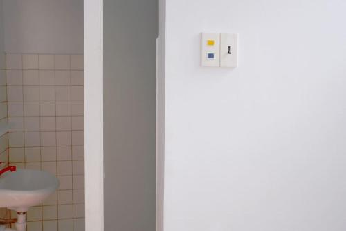 Koupelna v ubytování Joie Home