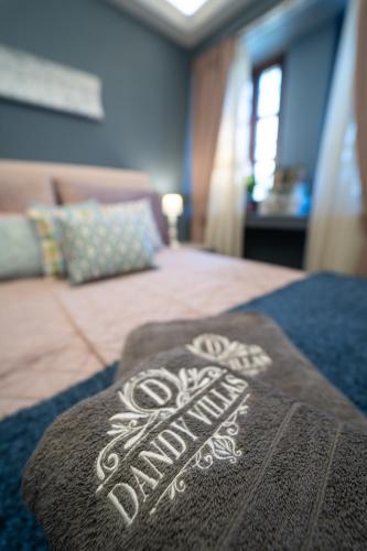 a close up of a bed in a room at Dandy Villas Nymfaio - Snow Queen - Sauna - Fireplace - Up to 6 adults 2kids in Nimfaíon