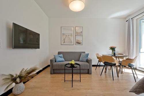 Posezení v ubytování BlueApart Apartamenty Hotelowe Nexo