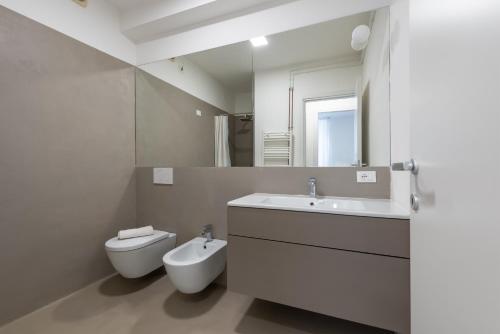 Ванная комната в Residence Orti 18 by Wonderful Italy
