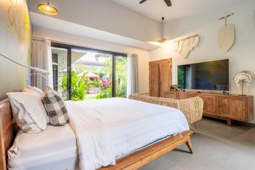 Cama o camas de una habitación en Chakola Villa Ubud