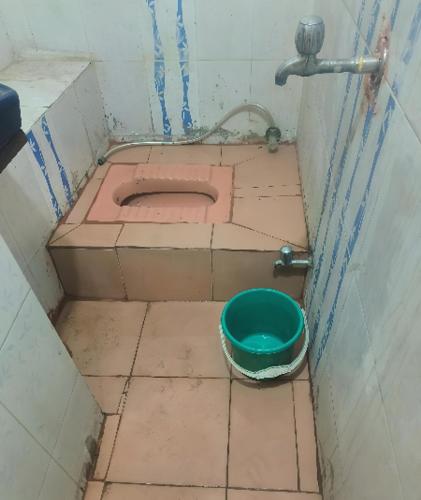 Ванная комната в House 1 First Floor Sidhi Vinayak Complex
