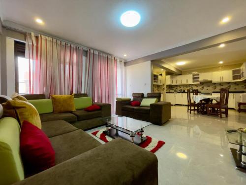 Χώρος καθιστικού στο Charming 2-Bed Apartment in Kigali