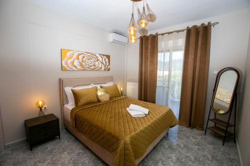 En eller flere senge i et værelse på Bay Maisonette