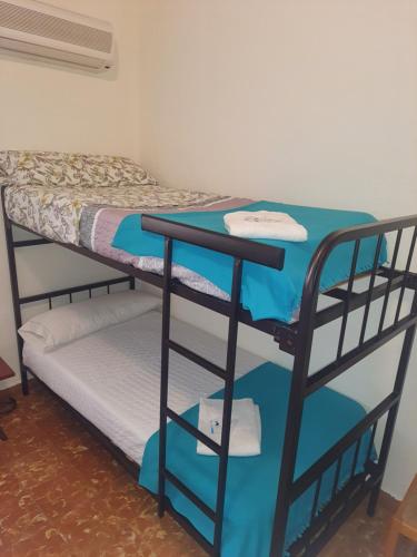 Bunk bed o mga bunk bed sa kuwarto sa Hostel Pilgrim's