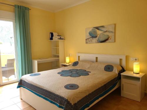 En eller flere senge i et værelse på Aldea del Mar II