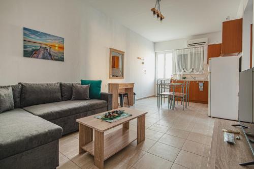 A kitchen or kitchenette at Basiliki's Apartments