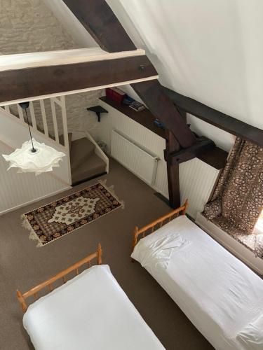 an overhead view of two bunk beds in a room at Atipyk'ododo in Saint-James