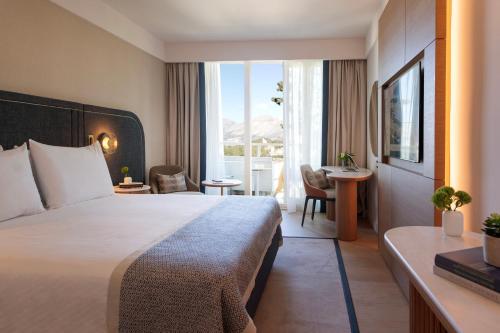 Кровать или кровати в номере Hotel Croatia