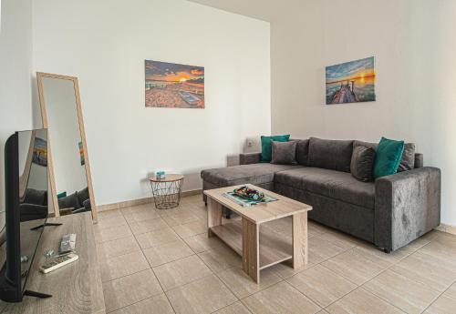 A television and/or entertainment centre at Basiliki's Apartments