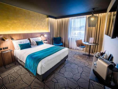 Кровать или кровати в номере Mercure Arras Centre Gare