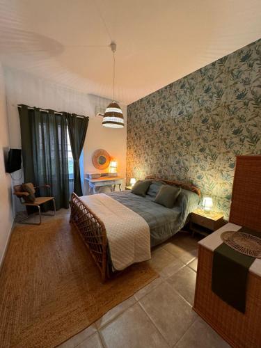La Casa di Via Nerviにあるベッド