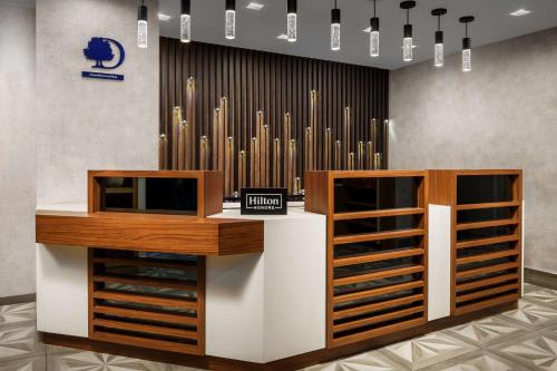 a wine tasting room with a large pipe organ at DoubleTree by Hilton New York Midtown Fifth Ave in New York