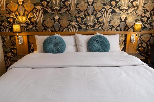 Ein Bett oder Betten in einem Zimmer der Unterkunft Starby Spa, Hotell & Konferens