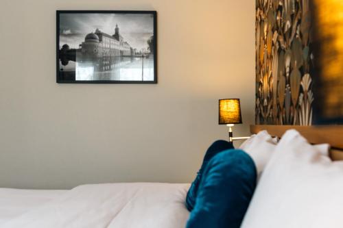Ein Bett oder Betten in einem Zimmer der Unterkunft Starby Spa, Hotell & Konferens