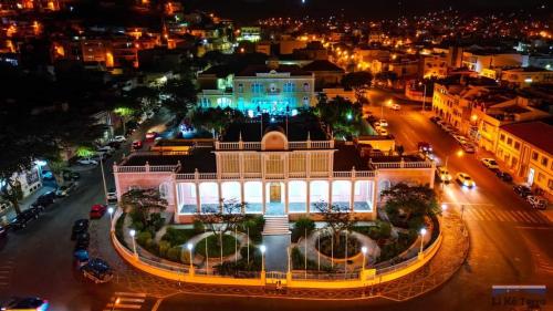 a view of a city at night with a building at Flat City Center Mindelo in Mindelo