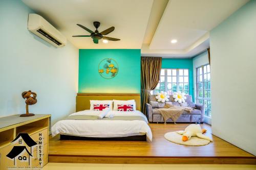 a bedroom with a bed and a couch at Seremban Bungalow Cosy Homestay 舒适宽阔独立式洋房 in Seremban