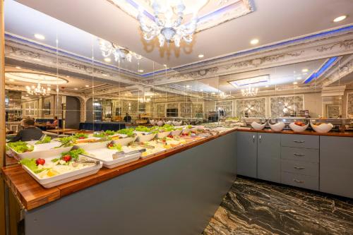 a buffet line with many plates of food at Best Nobel HotelS Old City İstanbul-Special category in Istanbul