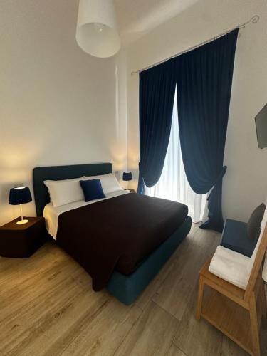 Postel nebo postele na pokoji v ubytování B&B Sigò