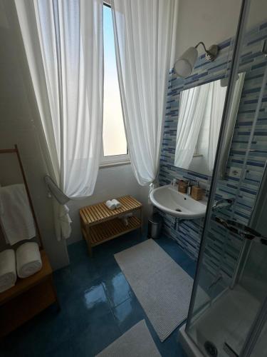 Koupelna v ubytování B&B Sigò