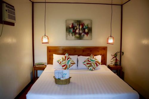 Cama ou camas em um quarto em Bella Athena Garden