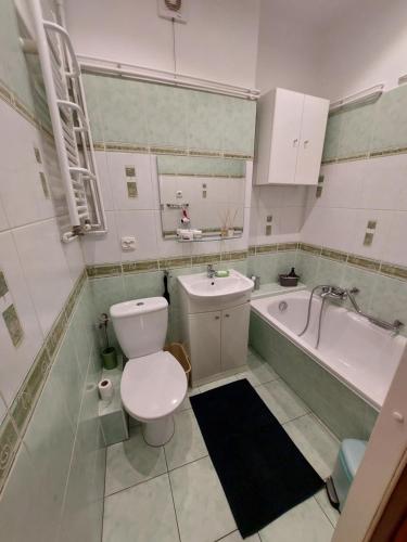 Kúpeľňa v ubytovaní Kamieński apartament