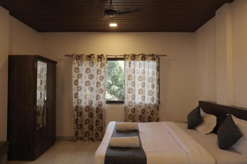 Katil atau katil-katil dalam bilik di Anant Villa & Resorts